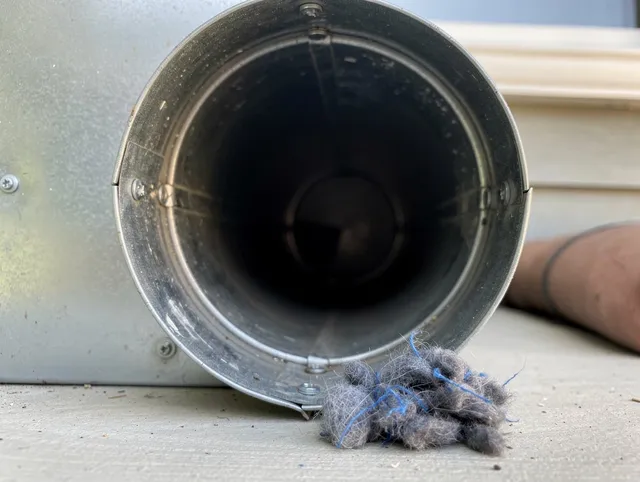 South Pasadena Dryer Vent Cleaning technician using specialized equipment to clear severe dryer vent blockage in South Pasadena